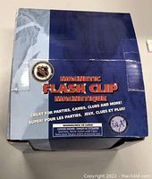 Closed box of Magnetic Flash Clips with NHL branding and description on front.