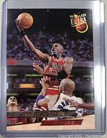 Front side of 1993-94 Fleer Ultra Michael Jordan basketball card showing Jordan in mid-air black Chicago Bulls uniform 23 with logo and name.