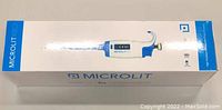 Photo of MICROLIT RBO Single Channel Variable Volume Micropipette unopened in original packaging, box showing product image and brand MICROLIT RBO.