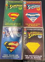 Front covers of four Superman comic books from 1993 'Reign of the SuperMen' series, showing different designs and colors.