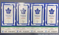 Photo of four Toronto Maple Leafs 2019 home opener ticket stubs, showing front face and section/seat details.