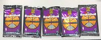 Five sealed Topps Stadium Club NBA Basketball cards packs for the 1993-94 season, Series 2, purple and orange pack design view from front laid flat showing series and branding.