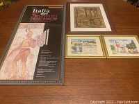 Overview photo showing four items in the lot: framed Italian gallery poster, framed watercolor painting, and two smaller framed prints.
