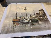Oil painting showing harbor boats scene with muted colors on canvas, edges unframed and no stretcher bars visible.