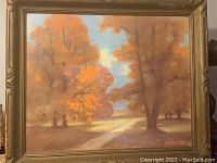 Framed large chalk painting on cardboard showing an autumnal landscape with orange trees, a pathway, and partly cloudy sky.