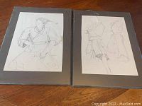 Two sketches of figures in traditional costumes on separate sheets, placed side by side.