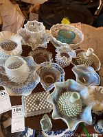 Overview of all hobnail glass pieces on table