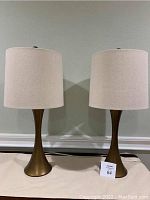 Both bronze table lamps side by side, showing shape and fabric shades