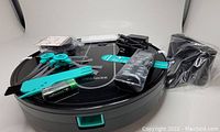 Deenkee robotic vacuum cleaner and included accessories displayed in packaging