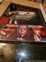 Photo of the Indian Art Knife box with Native American themed artwork and text.