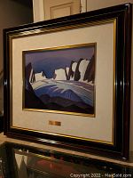 Front view of framed artwork on tabletop