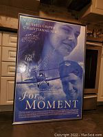 Full view of the professionally framed movie poster 'For the Moment' featuring Russell Crowe and Christianne Hirt. Signatures from cast visible on poster.