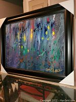 Front view of the framed painting showing complete artwork and frame