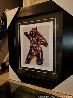 Framed artwork titled "Bear Spirit" by Don Chase, showing entire framed piece with protective corners.