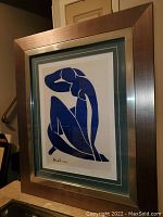 Full view of framed “Blue Nude II” print