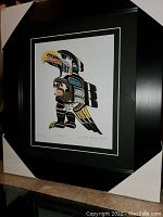 Frontal view of the professionally framed and matted print "Seagull" by Chief Henry Speck enclosed in a black frame and white-black dual matting, outside dimensions approx. 17.5x15.5 inches.