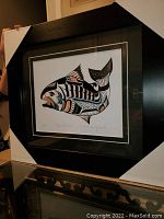 Framed artwork "Tyee Salmon" showing overall presentation, protective corners on frame.