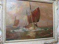 Front view of the oil painting depicting old sailing ships in the sea with prominent sails and waves, framed in a light-colored frame.