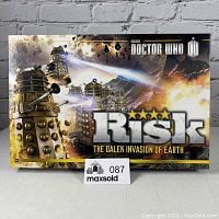 Closed box cover art showing Daleks and the title Doctor Who Risk The Dalek Invasion of Earth