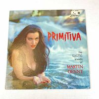 Front cover of Martin Denny Primitiva vintage vinyl LP album showing woman in water and album details