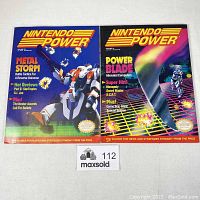 Front covers of Nintendo Power magazines Volume 22 and 23, displaying their titles, cover art, and feature stories.