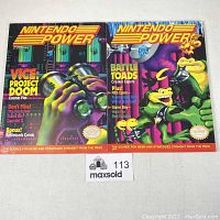 Two Nintendo Power magazines, issues 24 and 25, front cover view showing cover artwork and titles.