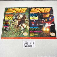 Front covers of Nintendo Power magazines Volume 26 and 27 showing artwork and featured content.