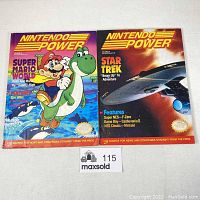 Both Nintendo Power magazines issue 28 and 29 laid flat side by side showing front covers and overall condition.