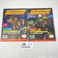 Front view of both Nintendo Power magazines issues 32 and 33 showing cover artwork and condition.