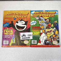 Front covers of Nintendo Power magazines issues 40 and 41 with artwork featuring Felix the Cat and Super Mario Kart characters.