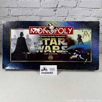 Front of Monopoly Star Wars Classic Trilogy Edition box showing logo and Star Wars images