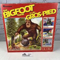 Box front with artwork showing Bigfoot and game title in English and French
