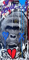 Close-up of central monkey face motif with black and white stripes, purple 'Love' text, blue drips and red heart tag.