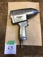 Front side view of the Snap-on impact wrench showing brand name and model condition.