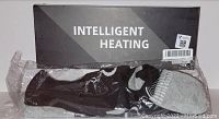 Photo showing the medium-sized heated socks in original packaging with 'Intelligent Heating' labeled on box.