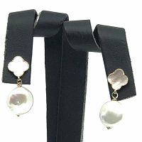 Pair of earrings displayed on black stand, showing full drop length and front profile