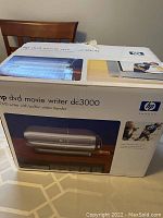 Box of HP DVD Movie Writer DC3000 showing the product image and branding on the front.