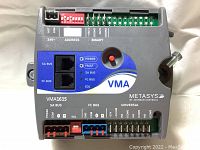 Top view of Johnson Controls VMA1615 showing ports, LEDs, rotary knob, and terminal connectors.