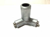 Front view showing the three extension arms and hollow cylindrical center.