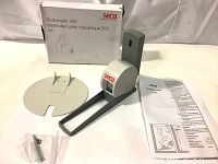 Photo of the Seca Bodymeter 206 measuring tape with its mounting bracket, screws, instruction manual, and original box displayed on a white background.