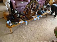 Front view of coffee table showing full length and tapered legs