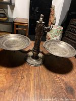 Front view of entire two-arm centerpiece on wooden table