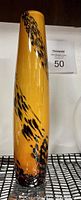 Single amber tall cylindrical glass vase with black speckled design