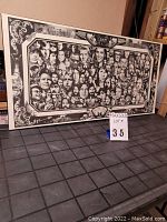 Full view of framed or mounted rock music collage print showing numerous musician portraits and decorative border on thick board.