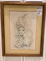 Full view of framed lithograph showing overall appearance, mat and frame.
