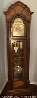 Front full-height view of Sligh grandfather clock
