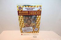 Front view of sealed Blood Syndicate #1 comic book showing Collector's Edition label and cover art.