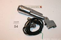 Electro-Voice Model 664 vintage microphone with cable visible, placed next to a ruler for size reference.