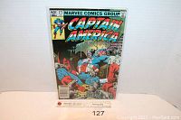 Front cover of Captain America comic book issue #272, shows vibrant colors and detailed cover art, in protective sleeve.