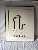 Full front view of framed print showing three geese image and double mat border